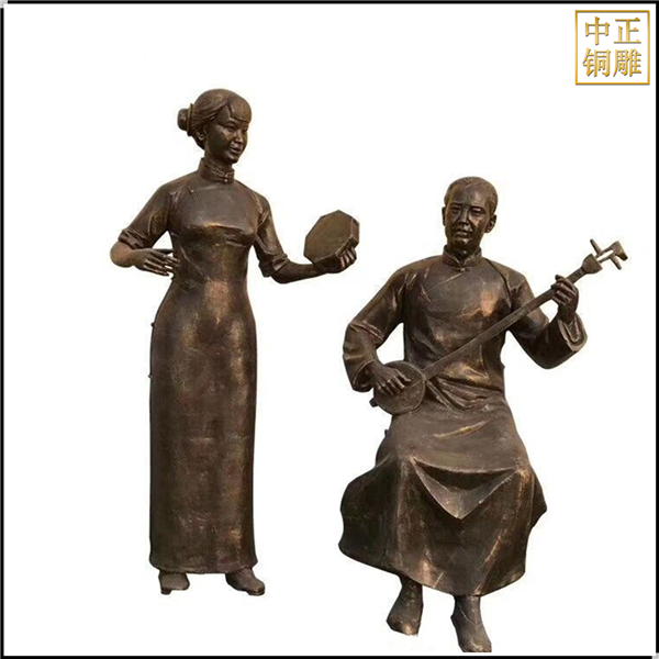 弾三弦民俗人物雕塑